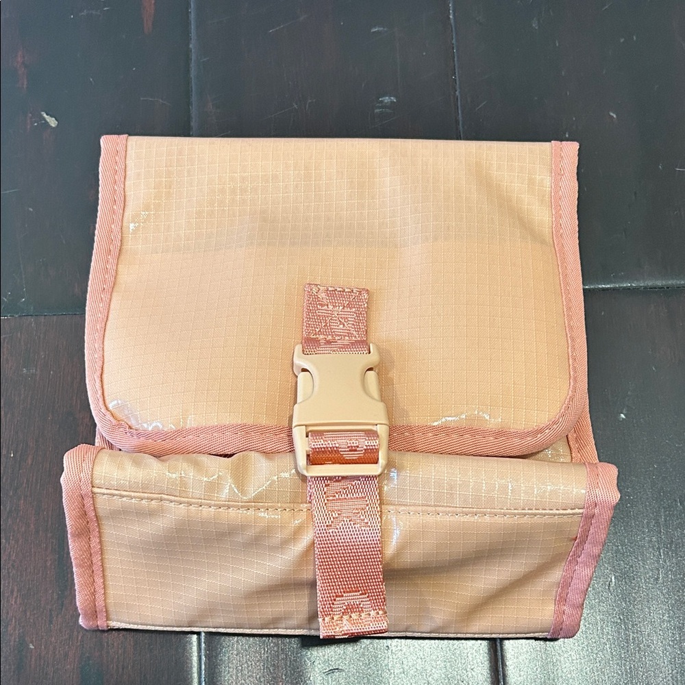 CALPAK Terra Hanging Toiletry Bag in the clay color